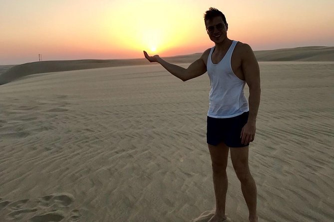 4 Hour Desert Safari, Camel Ride & Inland Sea Beach - Sandboarding and wide desert views