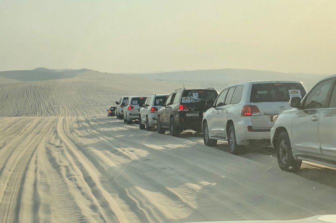 4 Hour Desert Safari, Camel Ride & Inland Sea Beach - Dune bashing across Qatar’s sand