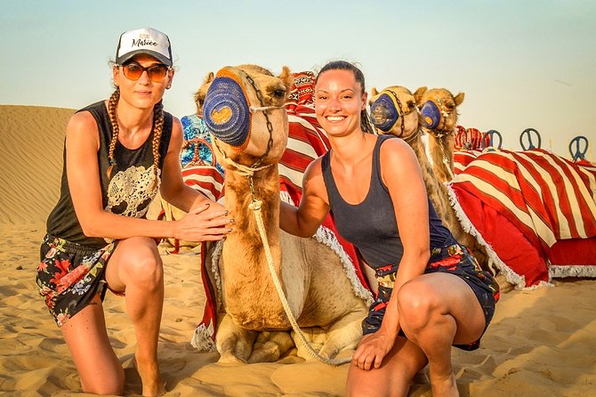 Abu Dhabi: Desert Safari with BBQ, Camel Ride & Sandboarding - Sunset and the Bedouin-style camp
