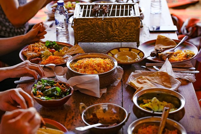 Abu Dhabi: Desert Safari with BBQ, Camel Ride & Sandboarding - BBQ dinner and evening entertainment