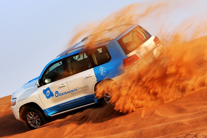 Abu Dhabi: Desert Safari with BBQ, Camel Ride & Sandboarding - Pickup and the ride into the Abu Dhabi desert