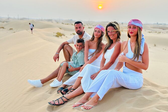 Abu Dhabi Desert Safari With Live Shows And BBQ Buffet Dinner - Camel rides, sandboarding, henna, and camp activities