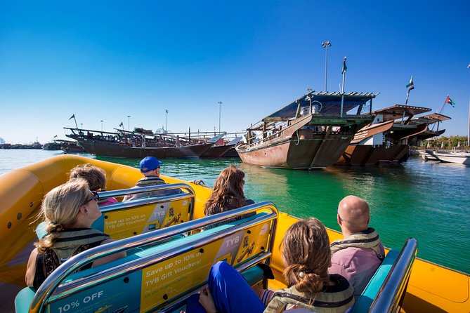 Abu Dhabi Guided Sightseeing Boat Tours - Seeing Abu Dhabi from a bright yellow RIB