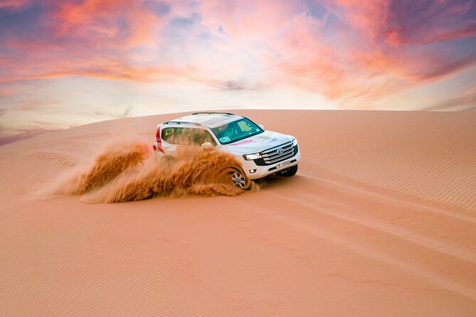 Abu Dhabi Morning Desert Safari: 4x4 Dune Bashing, Camel Ride and Sandboarding - A stop at the camel farm