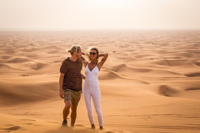 Adventurous Red Dune Desert Safari Deal with Quad Bike,Shows &BBQ - Sunset at the highest useful viewpoint
