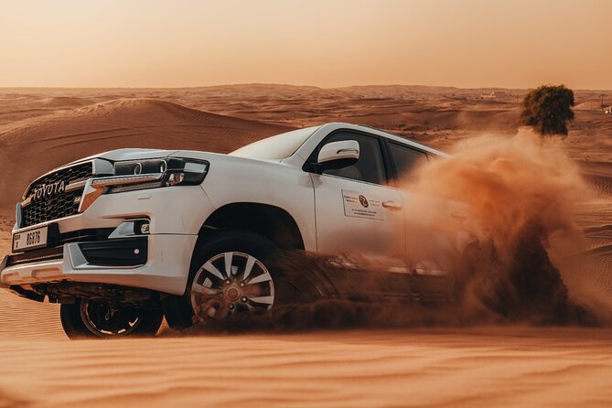 Deluxe Sunset Desert Safari: SandSurfing, Camel Ride & BBQ dinner - Leaving Dubai for the Red Dunes
