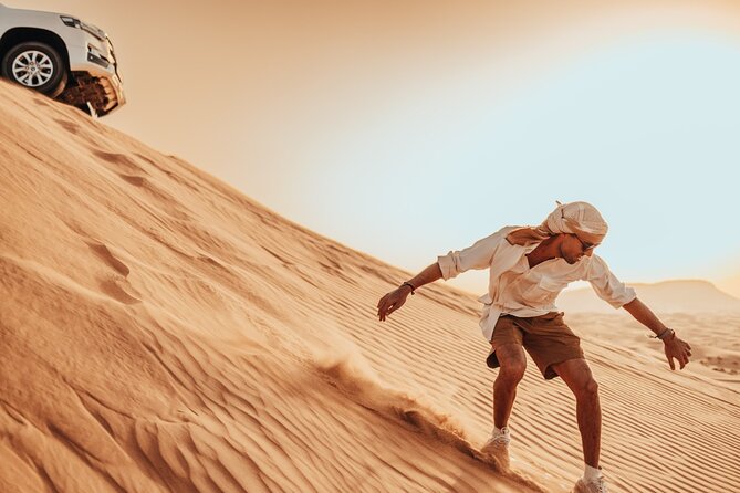 Deluxe Sunset Desert Safari: SandSurfing, Camel Ride & BBQ dinner - Thirty minutes of dune bashing and sandboarding