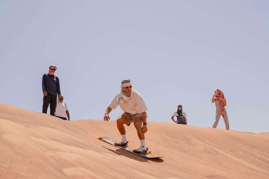 Desert Safari Dubai with Camel Ride, Sandboarding & Dinner - Leaving Dubai for the Lahbab Dunes