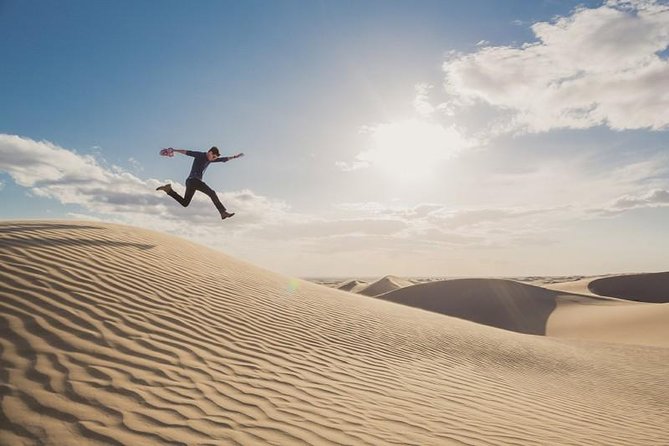 Desert safari, Dune bashing, sandboarding, camel, ATV Option - Dune bashing across the soft sand