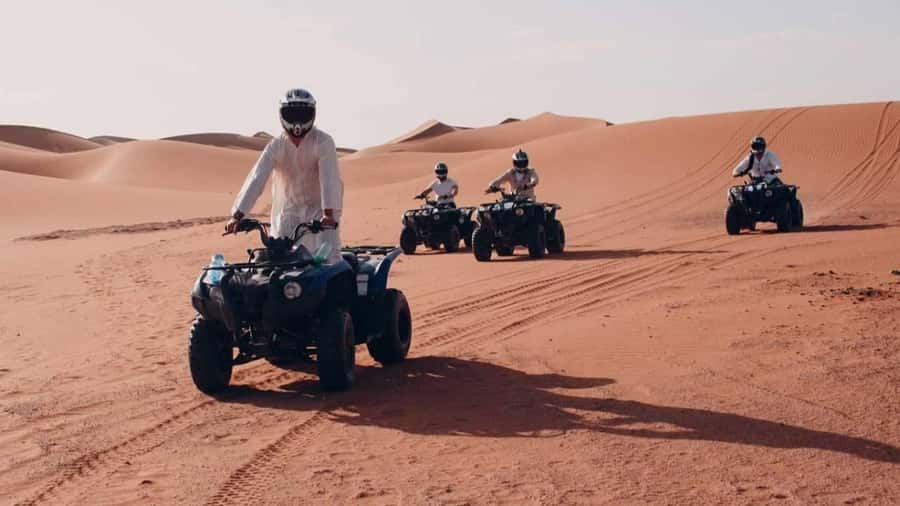 Desert Safari, Quad Bike, Camel Ride, Falcon & Sandboarding - Sandboarding from a high dune