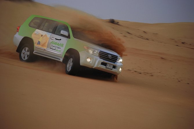 Desert Safari Tour, Quad Bike with BBQ Dinner & Show from Dubai - Dune bashing with a professional driver