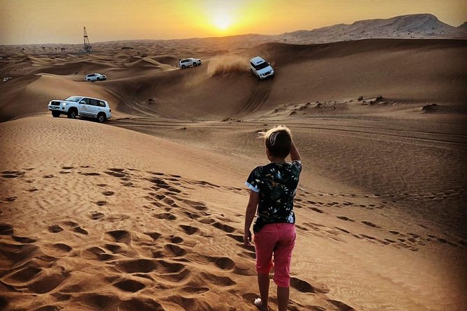 Desert Safari With BBQ Dinner, Quad Ride And And Sand-boarding - Pickup, group size, and how the timing feels