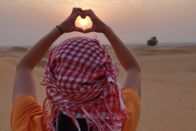 Desert Safari with Quad Bike, 4x4 Dune Bashing and Camel Ride - Barbecue dinner and live entertainment