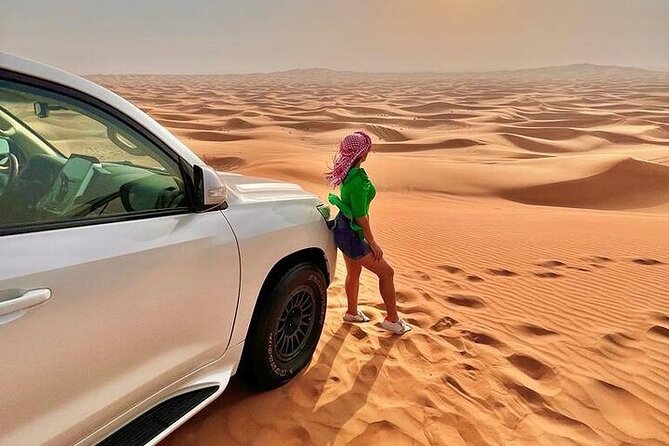 Desert Safari with Quad Bike Camel ride ,SandBoarding ,InalndSea - Your first stop: camels, coffee, and a practical pause