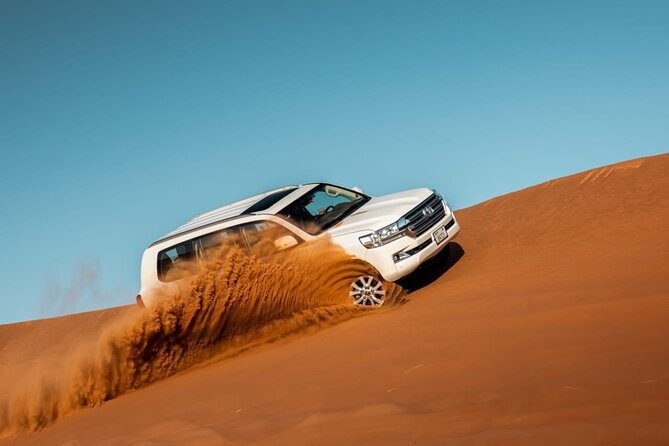 Desert Thrills: Evening Safari with Quad Bike & Camp Activities - Sandboarding and the sunset photo stop