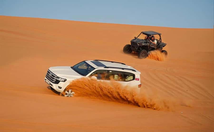 Doha: ATV/Desert Safari with Activities and Inland Sea Stop - Dune bashing in a 4x4