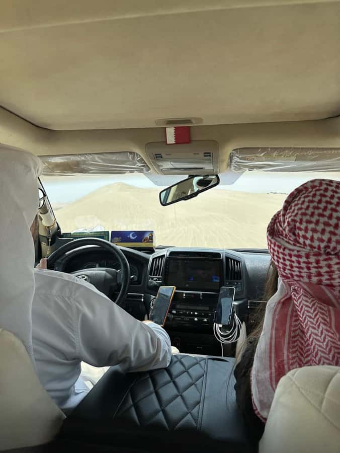 Doha: Desert Safari, Adventure, Sandboarding and Camel Ride - Sandboarding on soft golden slopes