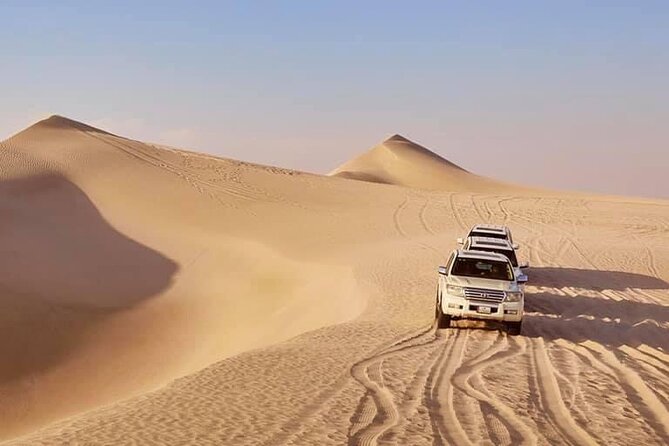 Doha: Desert Safari | Camel ride | Sand-boarding | Quad Biking - Sandboarding on the dunes