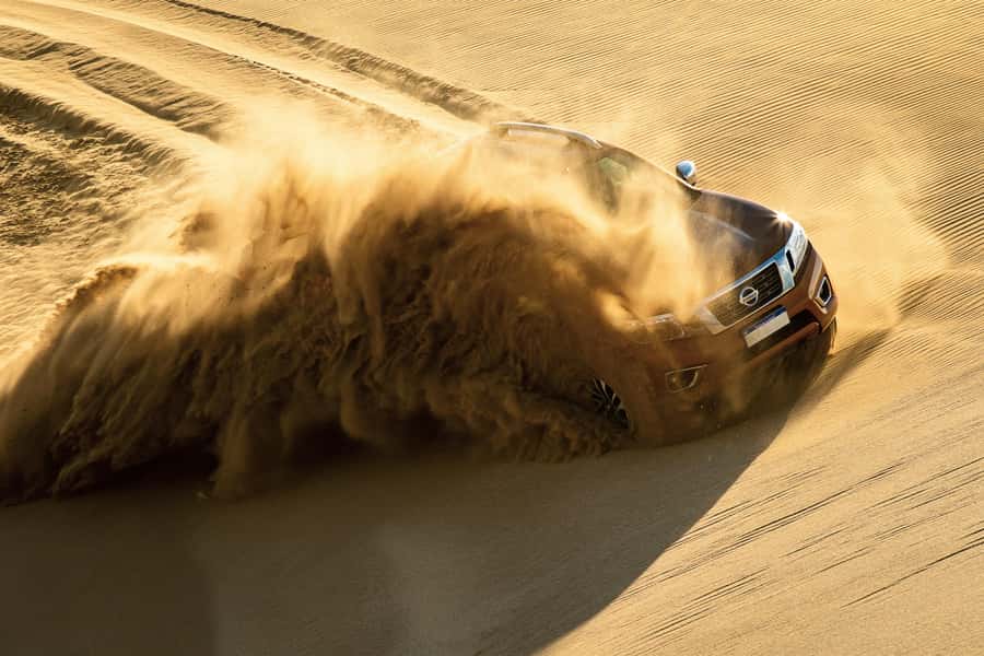 Doha Desert Safari: Sandboarding, Camel Ride & Swimming Fun - Khor Al Adaid, where sand meets the Arabian Gulf
