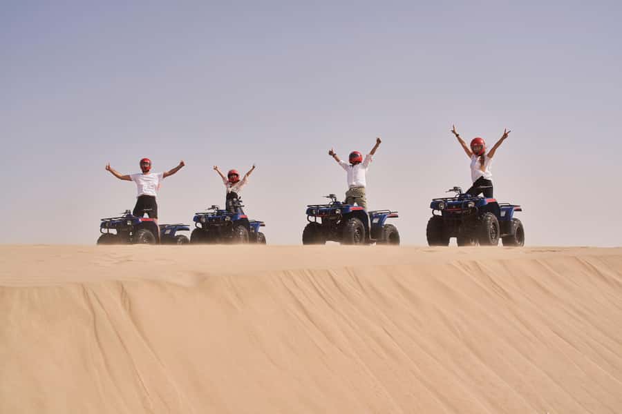 Doha: Desert Safari with Quad Bike, Sandboard & Camel Ride - Photographing the dunes and the Inland Sea