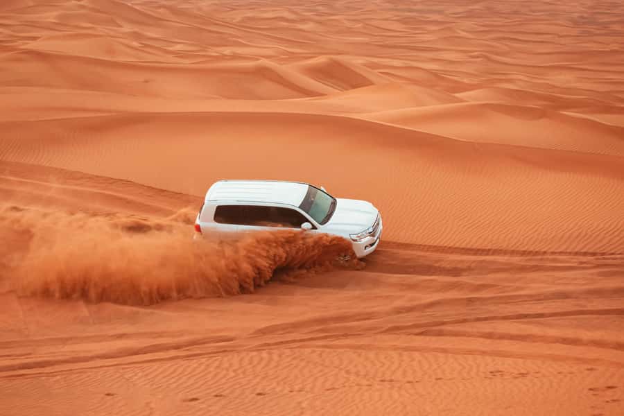 Doha: Desert Safari with Quad Bike, Sandboard & Camel Ride - Choosing the right guide and booking option