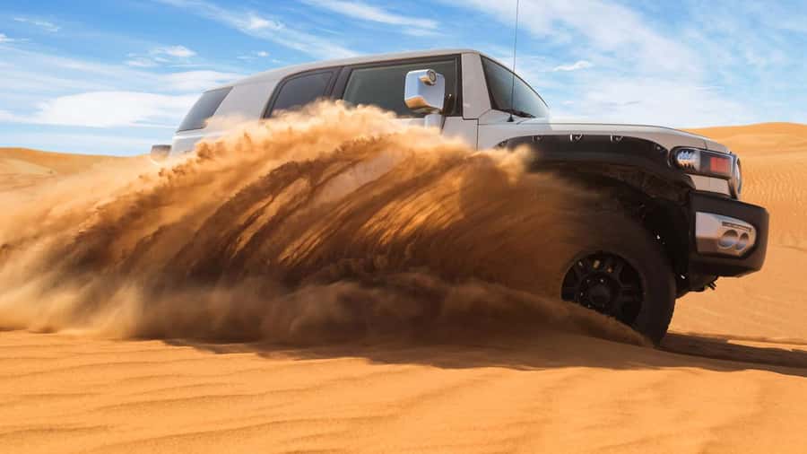 Doha: DesertSafari with Quad Bike, Camel Ride & Sandboarding - What the guides add to the experience