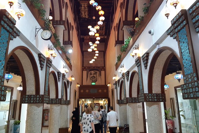 Doha from Land & Sea: City Tour & Traditional Dhow Boat Ride - The Pearl: polished Doha by the water