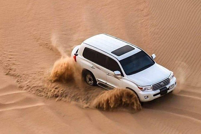 Doha :Half Day Desert Safari | Camel Riding | ATV | Sand Surfing - Leaving Doha for the southern desert