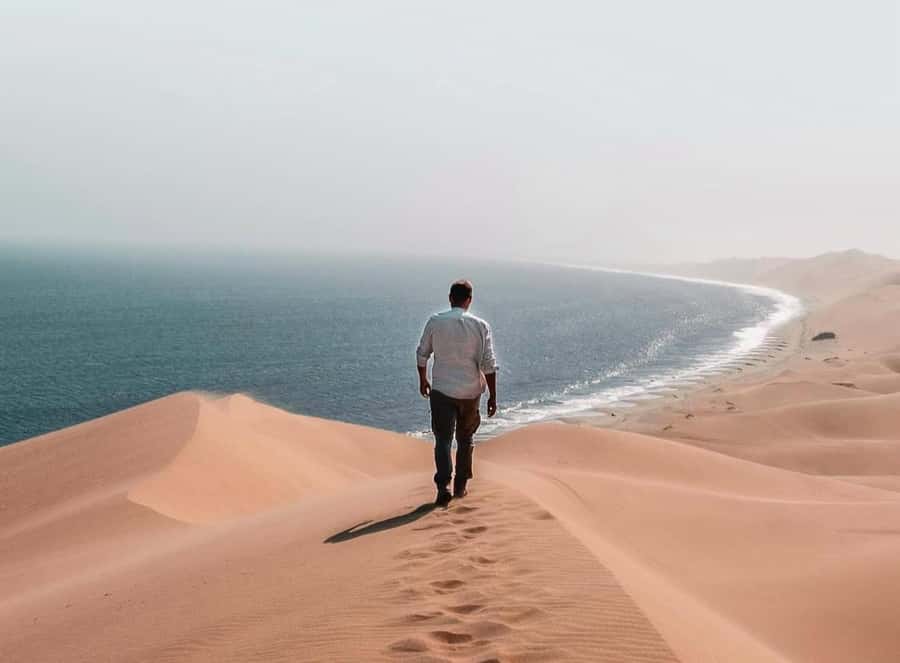 Doha: Inland Sea Desert Safari with Sunset & Sunrise Views - The first pause: tea, photos, and optional quad biking