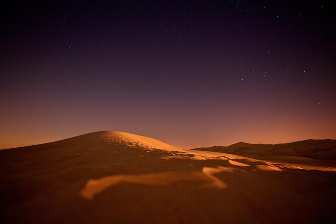 Doha Night Desert Safari Camel Ride Dune Bashing with Transfer - Khor Al Udaid and the Inland Sea after dark