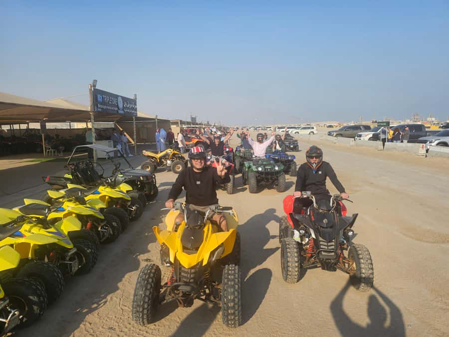 Doha: Quad Bike, Desert Safari, Buggy ride & inland sea tour - A short camel ride and falcon photographs