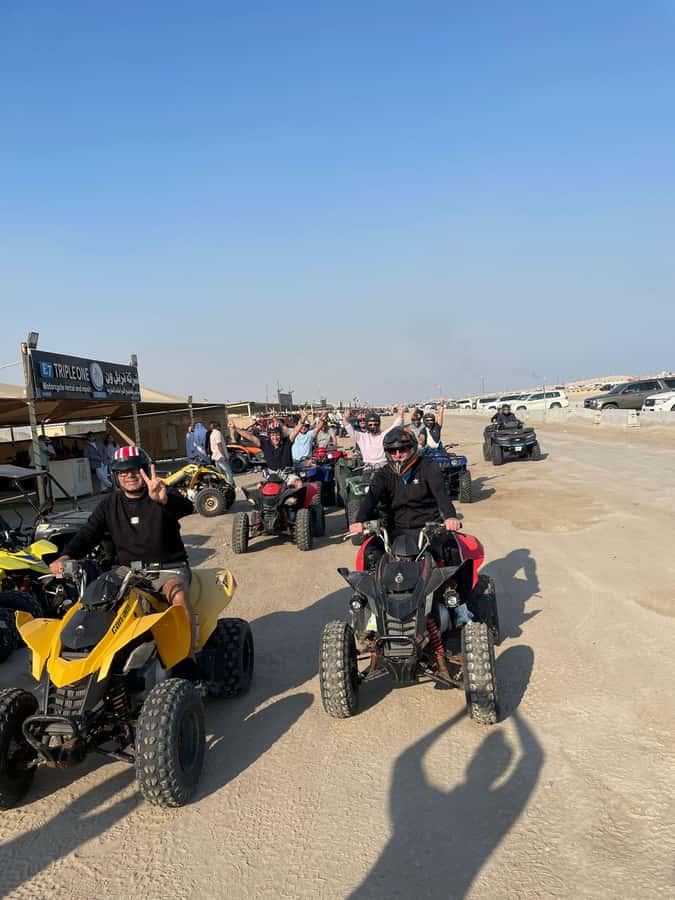 Doha: Quad Bike, Desert Safari, Buggy ride & inland sea tour - Quad biking on the desert tracks