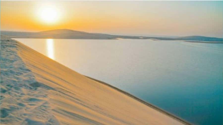 Doha :Sunrise/ Sunset Desert Safari CamelRide & Sandboarding - Sunrise or sunset at Qatar’s Inland Sea