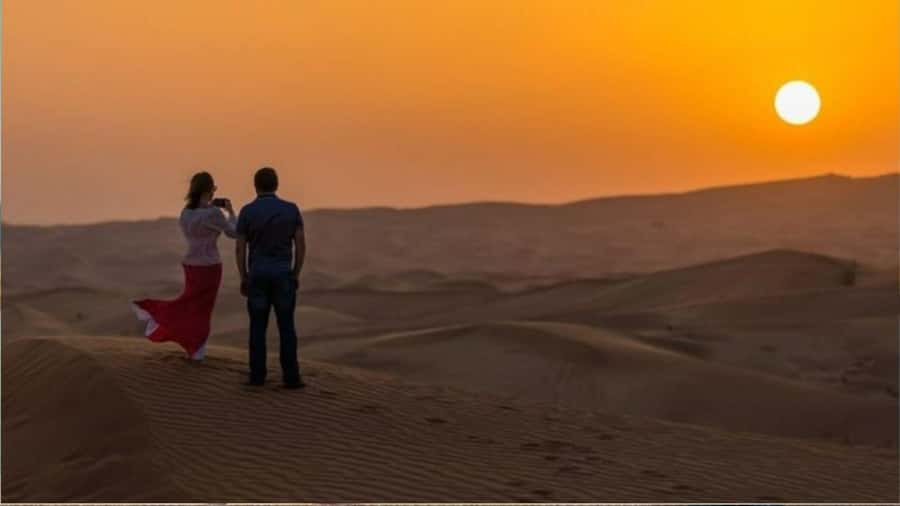 Doha :Sunrise/ Sunset Desert Safari CamelRide & Sandboarding - Sandboarding on the golden dunes