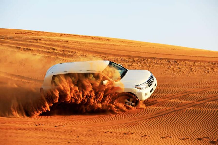Doha: Sunset Desert Safari, ATV, Camel Ride and Sandboarding - Khor Al Adaid makes the trip worth timing for sunset