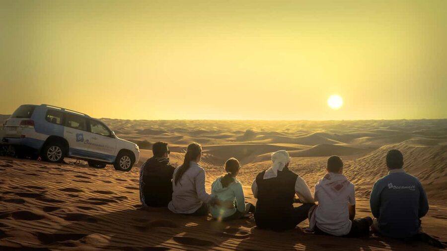 Doha: Sunset Desert Safari, ATV, Camel Ride and Sandboarding - Heat, clothing, and comfort