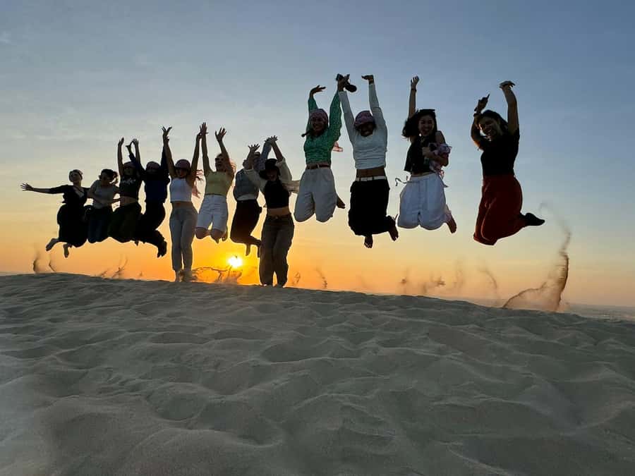 Doha: Sunset Safari, Dune Bashing, Sandboarding & Camel Ride - Dune bashing around the Inland Sea