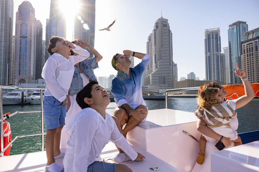 Dubai: Abra Boat Tour in Dubai Marina, Ain Dubai, JBR - A small boat with a big-city view