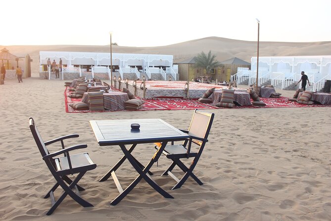 Dubai Afternoon Desert Safari and BBQ Dinner - Sand boarding and a short camel ride