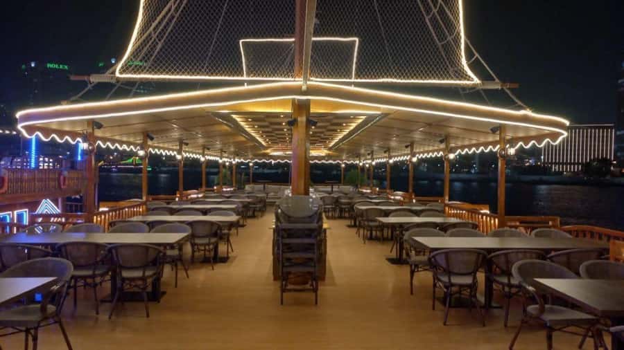 Dubai: Al Seef Largest Dhow Dinner Cruise with Live Show - Comparing the creek with a Dubai Marina cruise