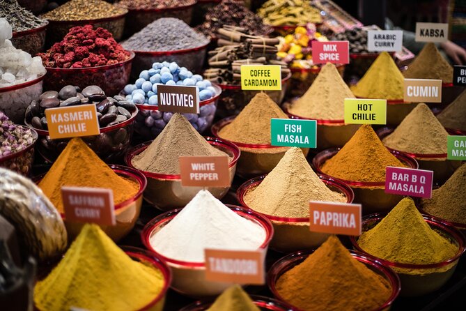 Dubai Aladdin Tour: Souks, Creek, Old Dubai and Tastings - Crossing Dubai Creek by abra