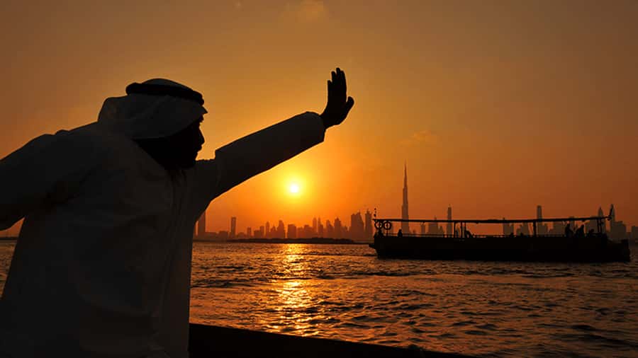 Dubai: Burj Khalifa Sunset on an Abra - Arabic music, commentary, and the pace of the ride
