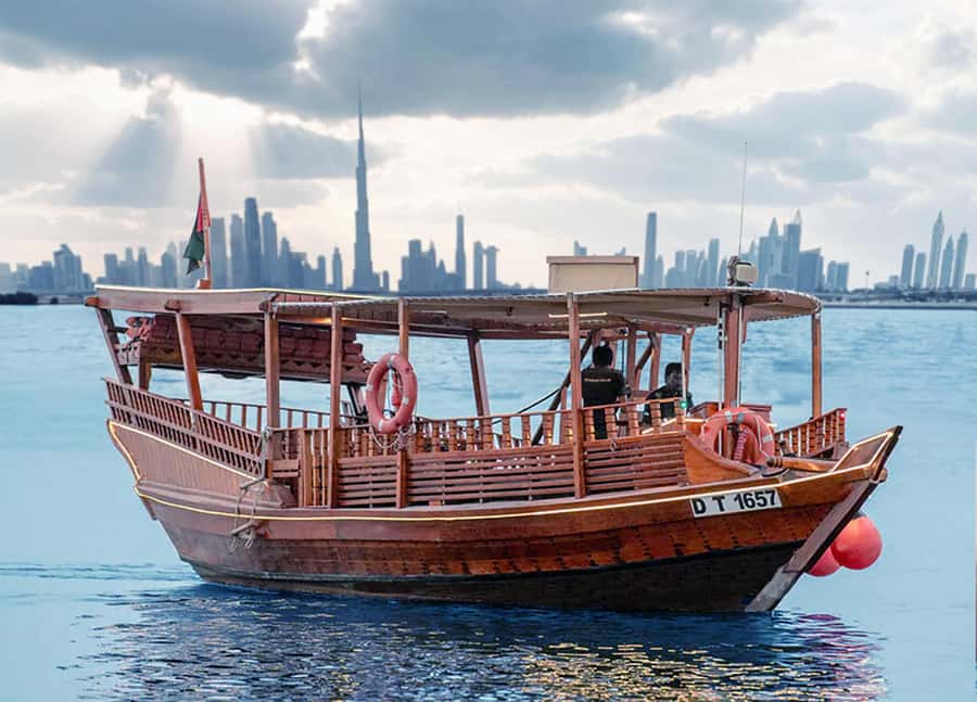 Dubai: Burj Khalifa Sunset on an Abra - Boarding a traditional abra