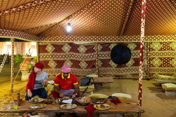 Dubai Camel Desert Safari, Traditional Meal & Heritage Activities - A torch-lit Bedouin-style camp