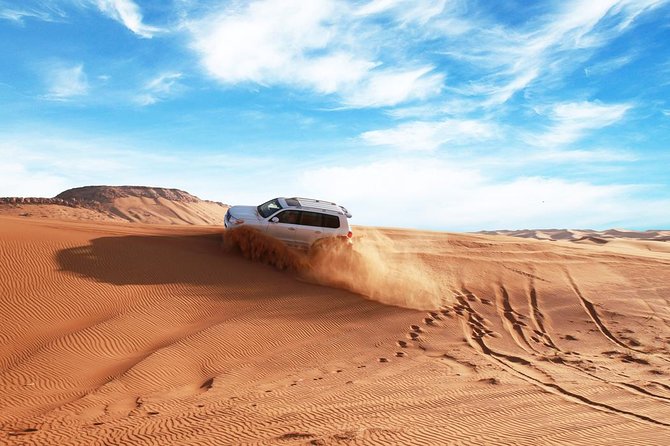 Dubai Desert Journey: Red Dunes Safari with BBQ in Bedouin Camp - The Drive to Lahbab and the 20-Minute Pause