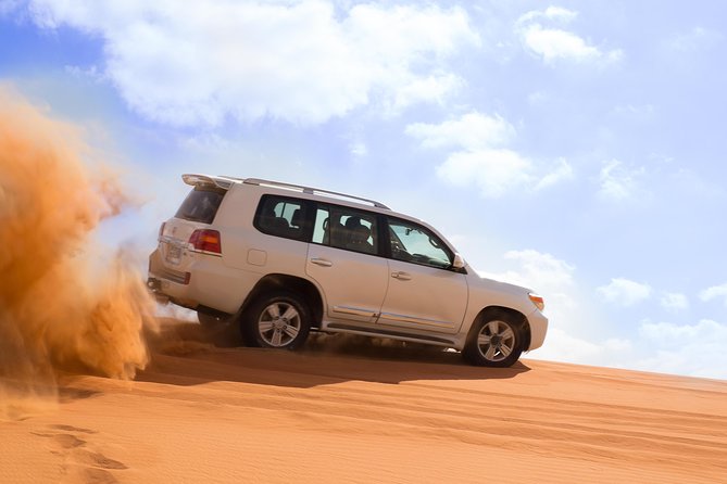 Dubai Desert Journey: Red Dunes Safari with BBQ in Bedouin Camp - Sandboarding and Sunset on the Highest Dune