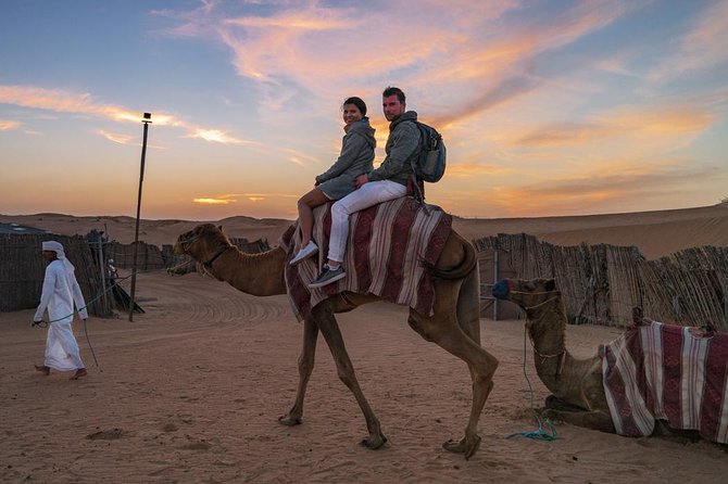 Dubai Desert Journey: Red Dunes Safari with BBQ in Bedouin Camp - BBQ Dinner, Belly Dancing, Tanura, and Fire