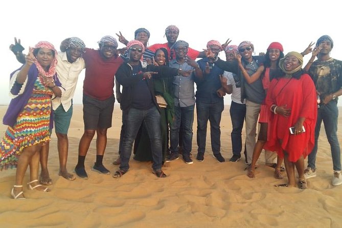 Dubai Desert Safari Adventure, 60mins ATV, Camel Ride, Shows, BBQ - Camp dinner brings food, drinks, and a crowd