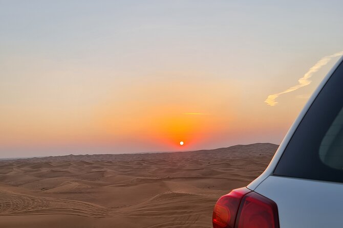 Dubai Desert Safari & Buffet Dinner and Camel ride with PRIVATE CAR - Sandboarding and the sunset photo stop