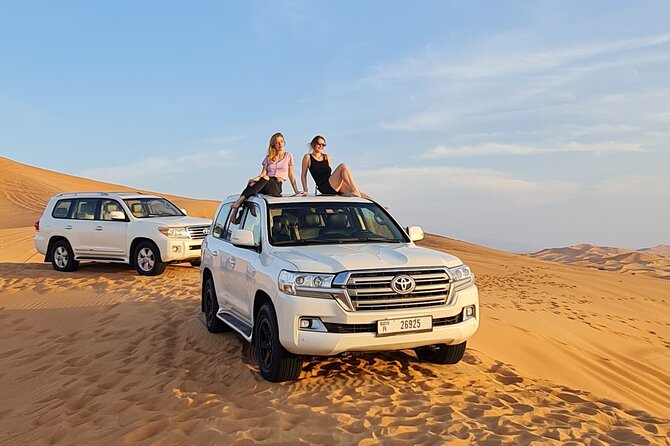 Dubai Desert Safari & Buffet Dinner and Camel ride with PRIVATE CAR - Camel riding at the shared Bedouin camp